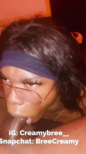 Ebony sissy stares into his soul while slurping his big dick