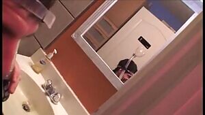 Whore being fitted for a Cum-Bong prior to her bukkake with a room full of sweaty perverts