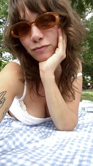 Don’t mind me, just getting my tits out in the park