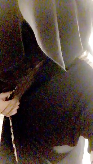Sexy strip tease in a burka