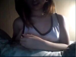 Boobs popping out of her tank top